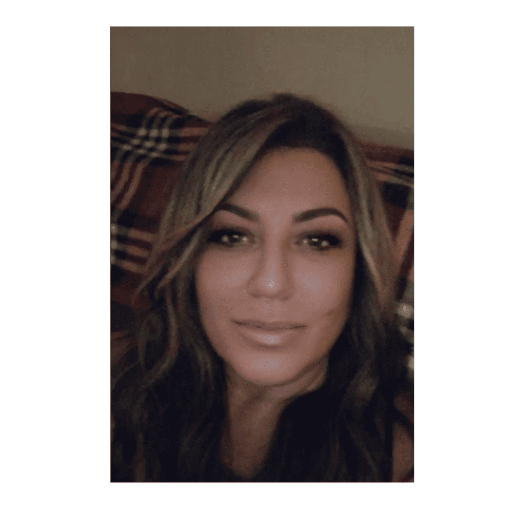 Portrait of Linda, a professional stylist at Somerby's Hair Salon, showcasing their expertise and style.